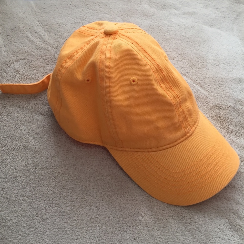 orange baseball cap